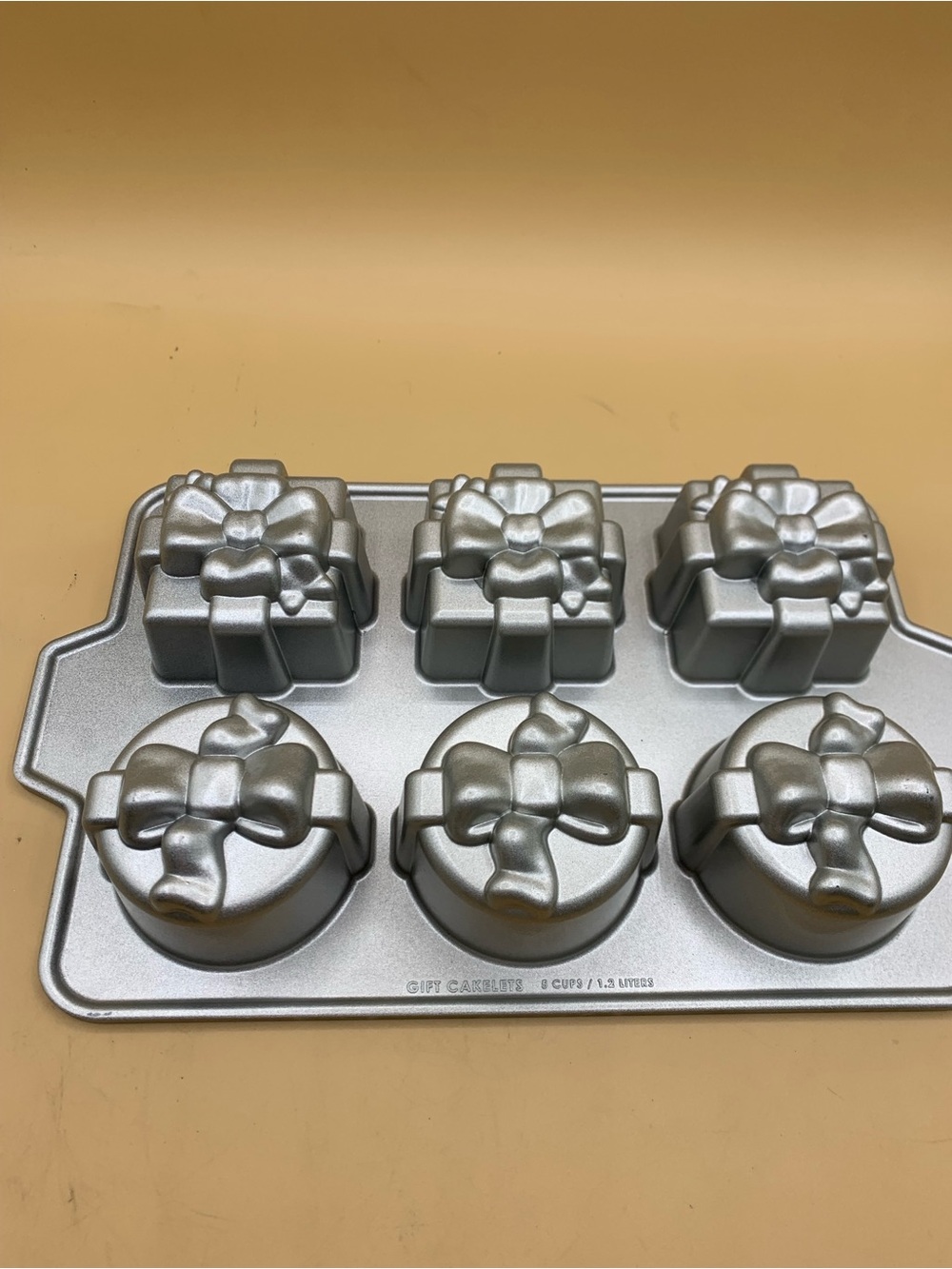 Nordic Ware Silver Gift-Shaped Nonstick 6-Cavity Cake Pan